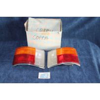 A112 2°S.   COPPIA FANALINI POST. CON RETRO  BORDO BIANCO   ARIC