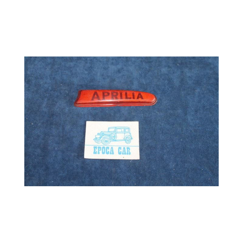 APRILIA   ORANGE LENS WRITTEN "APRILIA" FOR PLATE LIGHT