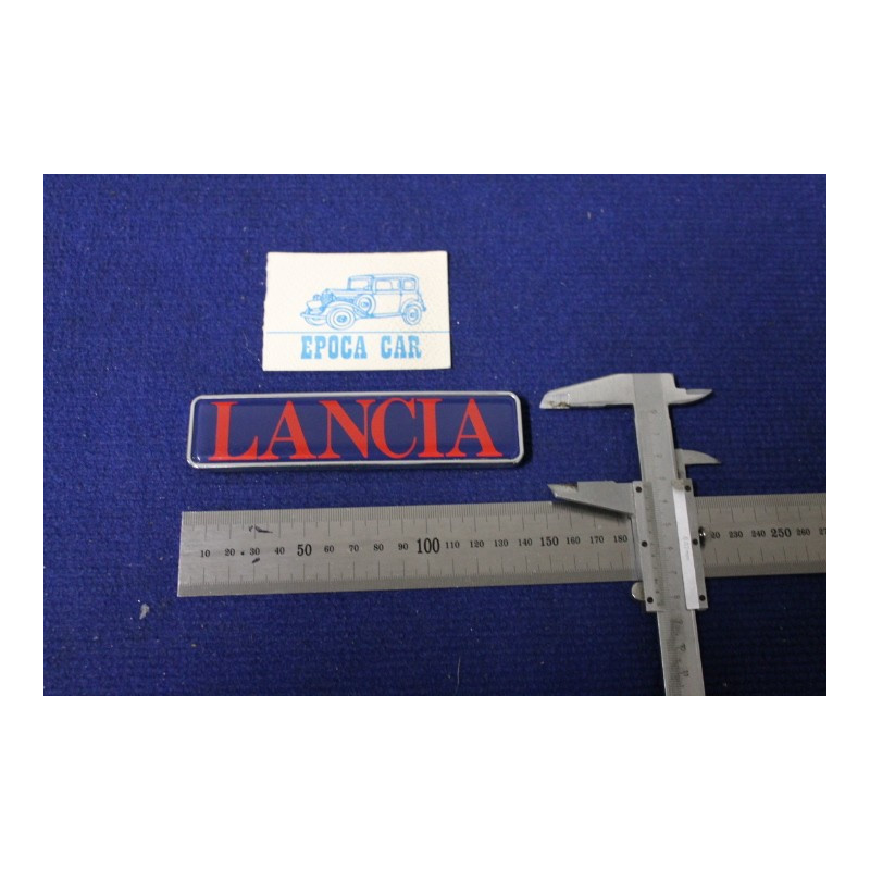 EMBLEM "LANCIA" (RED AND BLUE)  PLASTIC