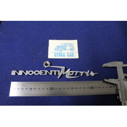 SCRITTA "INNOCENTI MORRIS" METALLO CROMATO