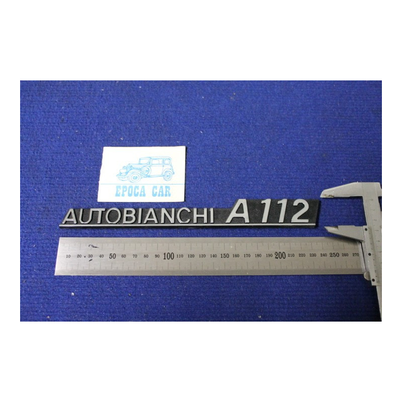 EMBLEM "AUTOBIANCHI A 112"  SILVER WRITING  PLASTIC