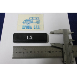 EMBLEM "LX" LATERAL FOR A112  PLASTIC