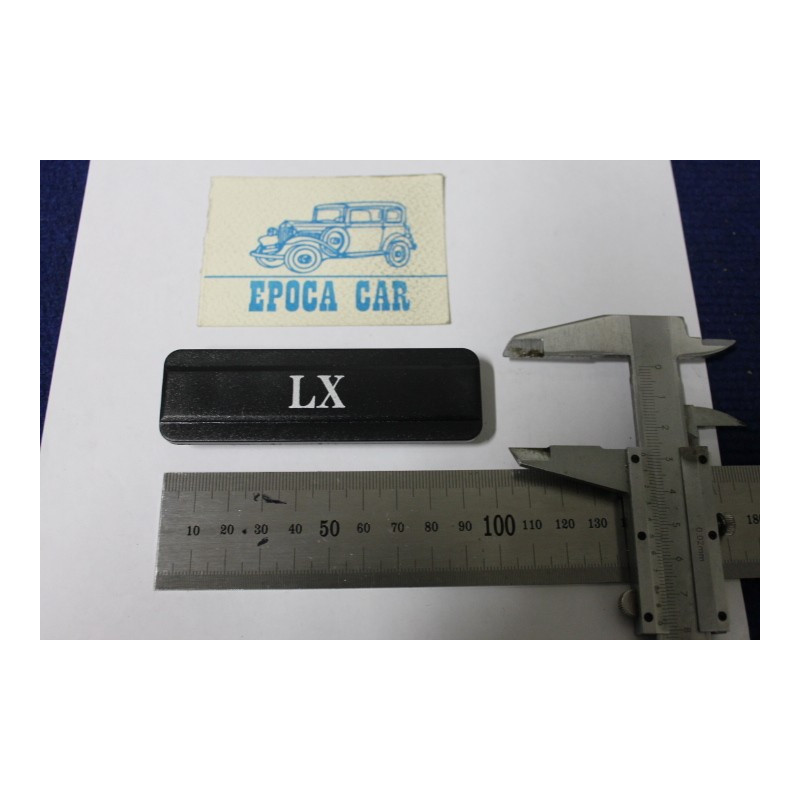 EMBLEM "LX" LATERAL FOR A112  PLASTIC