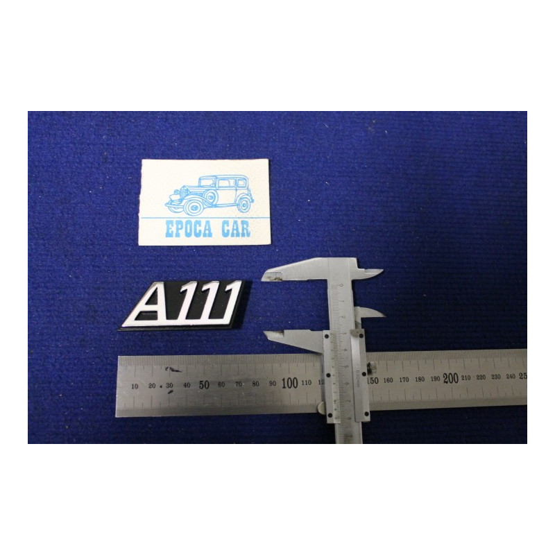 SCRITTA "A 111"   METALLO CROMATO SU FONDO NERO