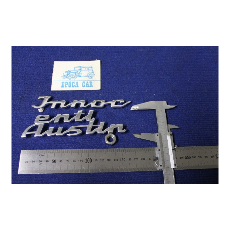 SCRITTA "INNOCENTI AUSTIN" (DUE PEZZI)   METALLO CROMATO