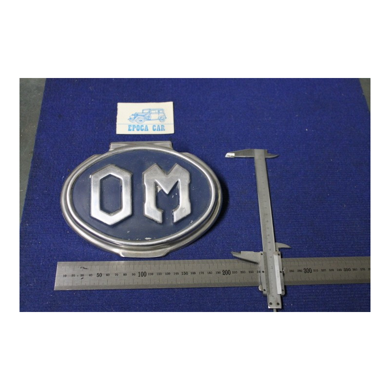 STEMMA "OM" LUNGH. 200 mm  (ATTACCO A MOLLA)   METALLO CROMATO SU FONDO BLU'