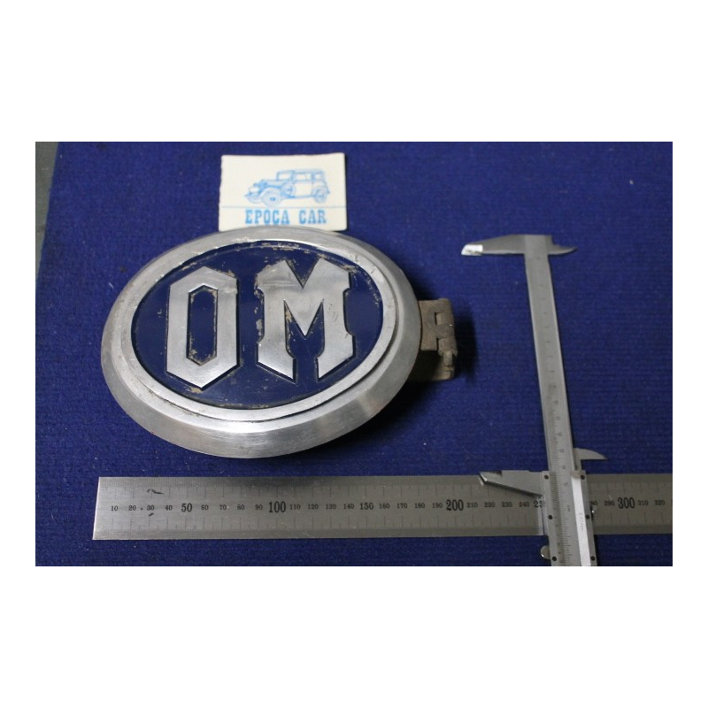 STEMMA "OM" LUNGH. 180 mm   METALLO SU SFONDO SMALTATO BLU'