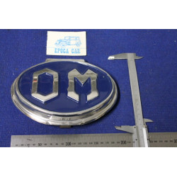 BADGE "OM" LENGHT 195 mm  METAL CHROME IN BLAU BACKGROUND