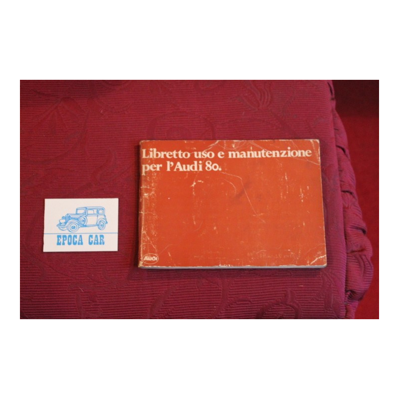 AUDI 80      USE AND SERVICE BOOK (1980) IN ITALIAN  cover with little defect.